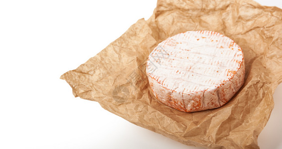 食物午餐一顿饭新鲜的三奶乳酪是天然的在棕纸背景上图片