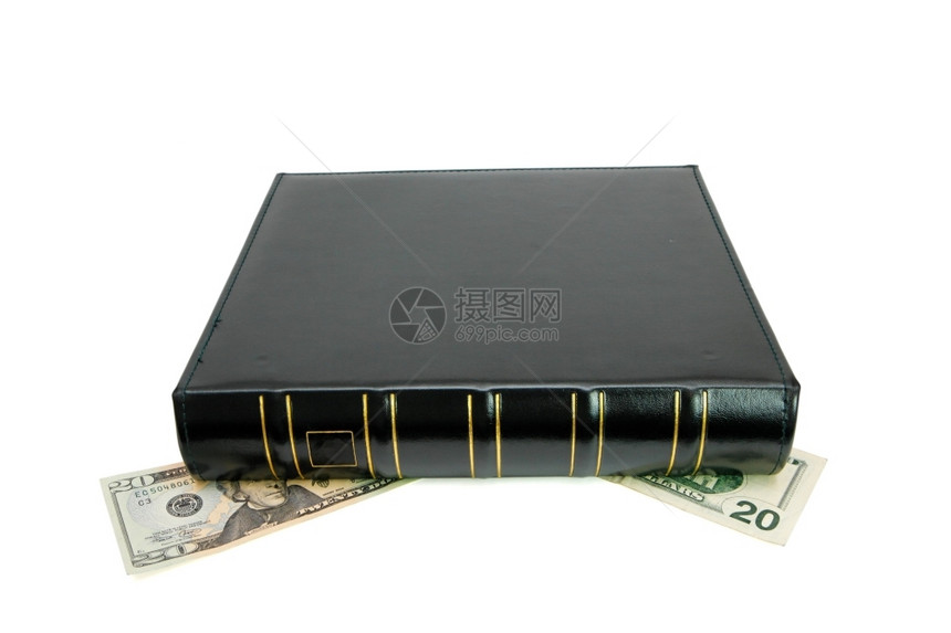 专辑美元精装厚黑色的书有金修饰将20块钱的钞票挤压下来图片