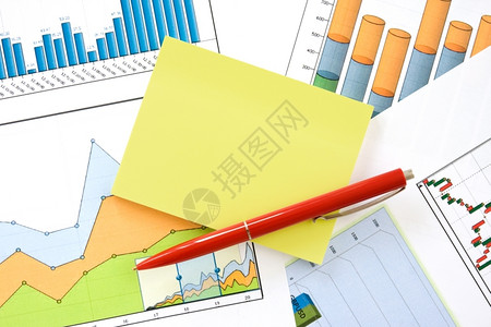 超过财务图表的红色和黄备忘录商业经济的黄色图片