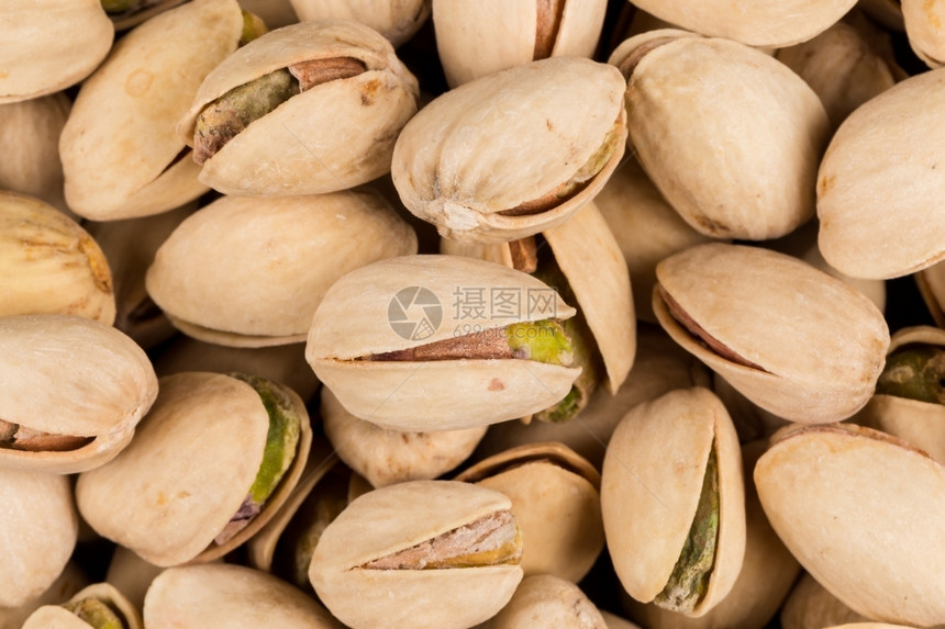 营养可口Pistachio坚果安排作为背景贴近的健康图片