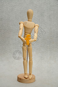塑像人体模型身持F信的木制假人高清图片