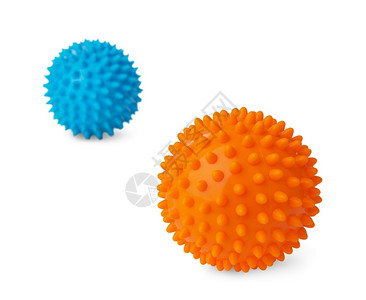 药物质地在白色背景中孤立的两只脊椎塑料橙色和蓝按摩球以橙为焦点背景图片