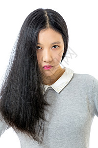 模型脸年轻亚洲高中女生肖像半面挂着头发的亚洲女中学生青少年图片