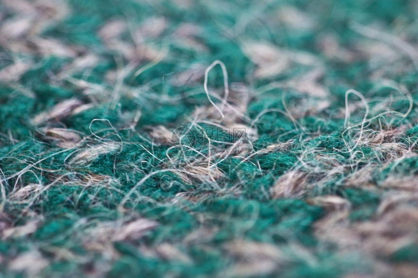 抽象的蓬松密闭了一只毛织的片大部分是绿色羊毛纤维图片