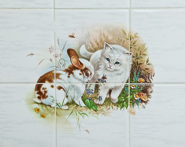 丰富多彩的兔子和猫装饰瓷砖用过质地图片