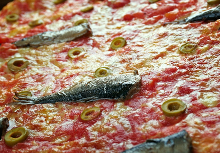 牛至Sardenara西利古里亚的零食类似比萨饼相的番茄背景图片