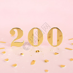 数字是粉红背景的20个金数和文本的面纸间空子婚礼奖图片
