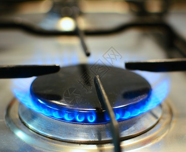 用厨房燃煤气炉火烧毁器厨师滚刀热的图片
