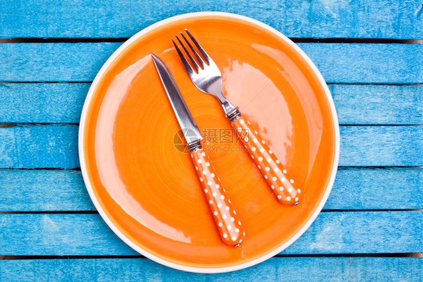 一顿饭用具空盘子和叉刀橙图片