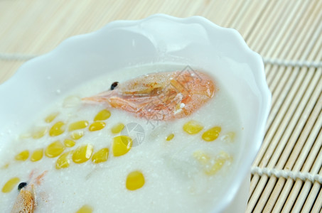 美龄粥牛奶一顿饭甜的玉米螃蟹汤在烹饪美华和加拿大中文烹饪发现的菜盘背景