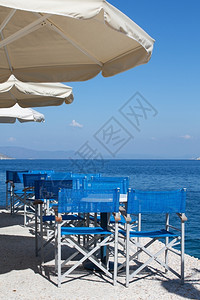 阳伞十二指肠位于希腊多德卡尼塞岛之一的爱琴海餐馆经过图片