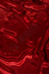 红沙丁鱼布面背景闪亮丝绸波纹海浪天鹅绒图片