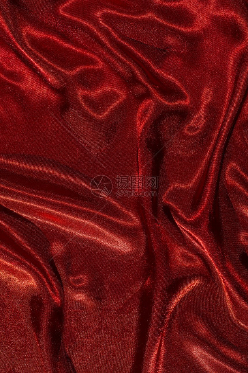 红沙丁鱼布面背景闪亮丝绸曲线闪亮的布料图片