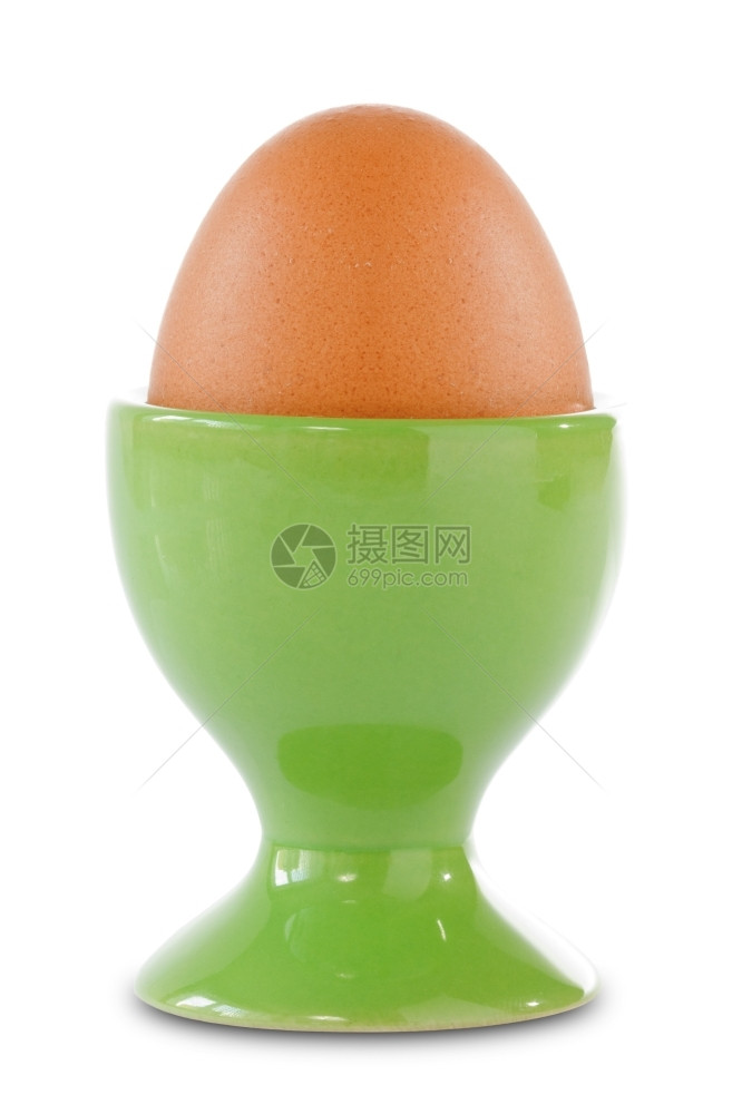 早餐绿杯中的棕蛋在白色背景上被孤立椭圆形单身的图片