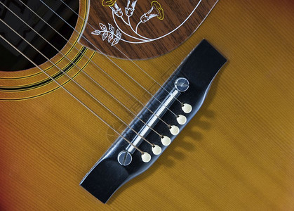西红吉他音乐器配有连弦紧贴西红吉他音乐器娱蝴蝶岩石图片