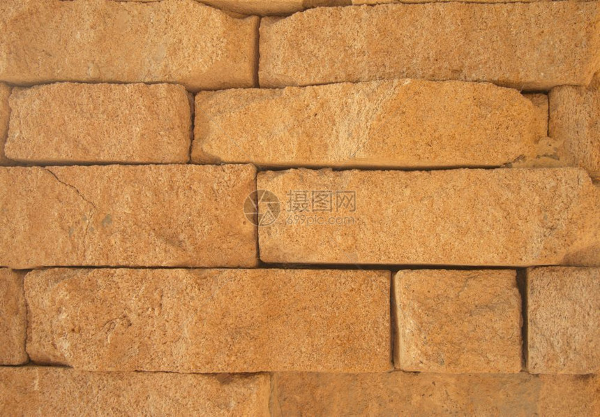 坚硬的Grunge古黄砖墙形石Stone原石质纹理背景阵列位置堵塞结构体图片