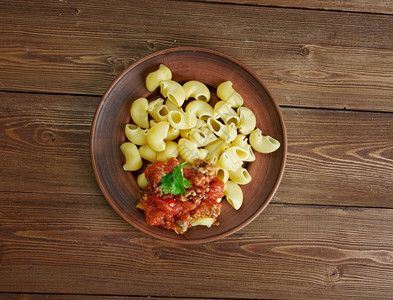 香料番茄装有肉酱的自来水意大利面健康图片