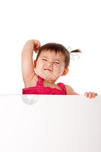 木板可爱的婴儿宝肌肉手臂表达力量的和皱眉脸握着白板与世隔绝有趣的抓住背景图片