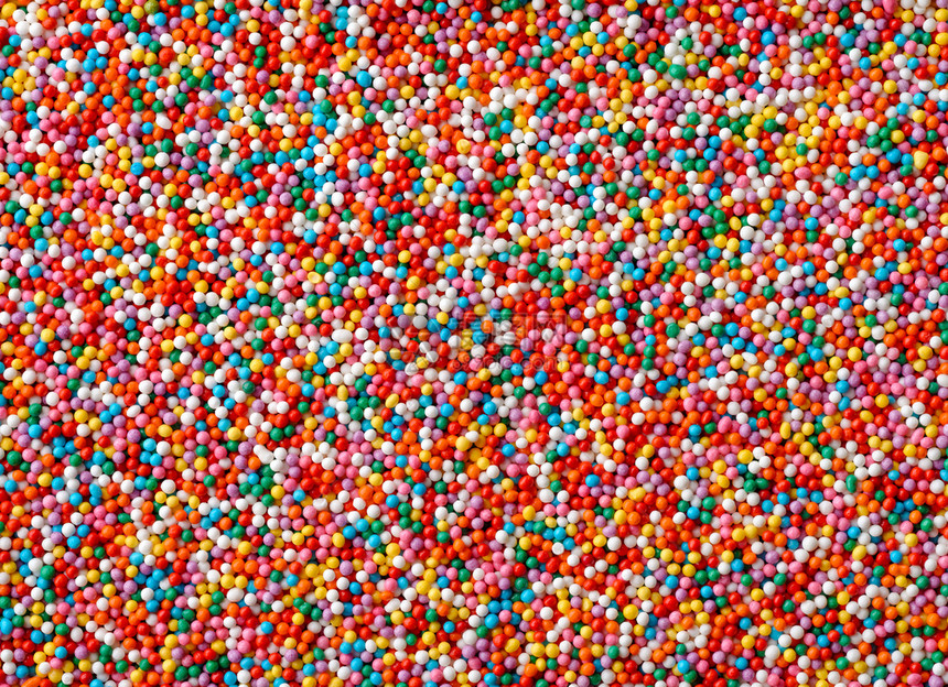 棕色的背景和纹理有很多色糖果滴子甜食抽象摘要多彩糖果滴子千彩糖果滴子质地甜的图片