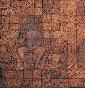 亚洲人古老的泰国佛教寺庙雕刻救济品浮图片