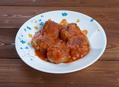 传统的摩洛哥美食番茄酱中的鱼丸土豆酱美味的剁碎图片