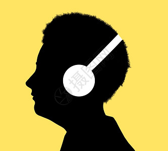 听到享受音乐有听力测试或用音频学习的人光照影背玩技术图片