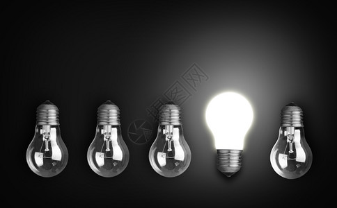 领导用一排灯泡来构思理想概念其中之一在发光黑色的目图片