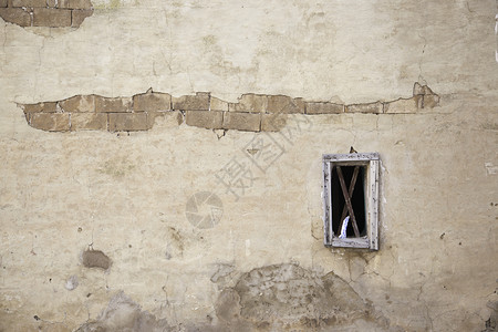外部的正面古老破旧外墙详细描述一堵有农村细节的旧砖墙背景贫困图片