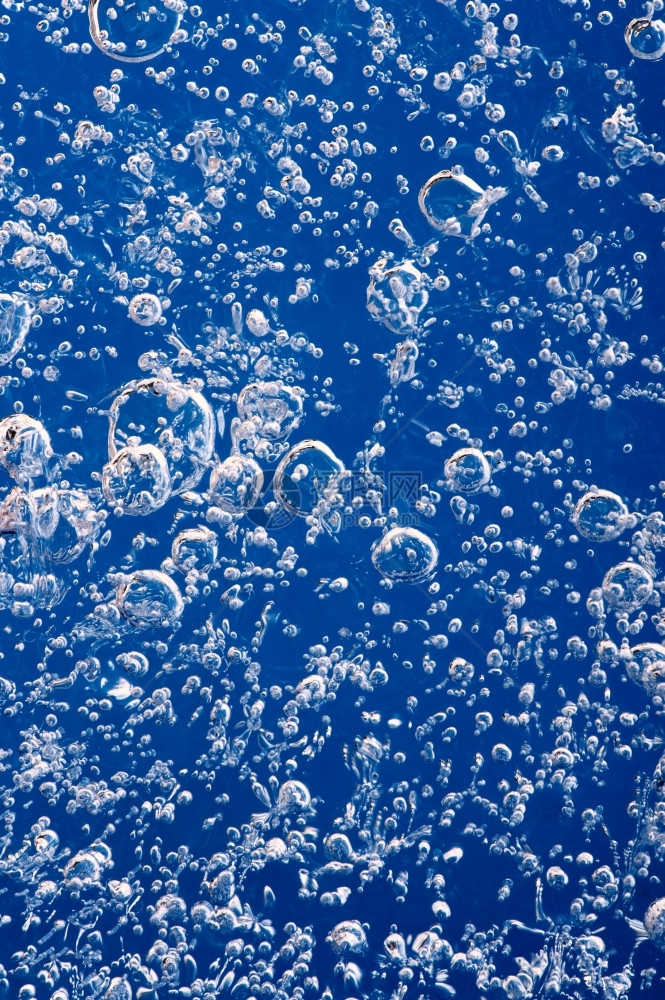 蓝色的氧创造力冷冻于冰中的气泡图片