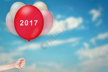 未来旅行手持2017气球天空模糊背景一月图片