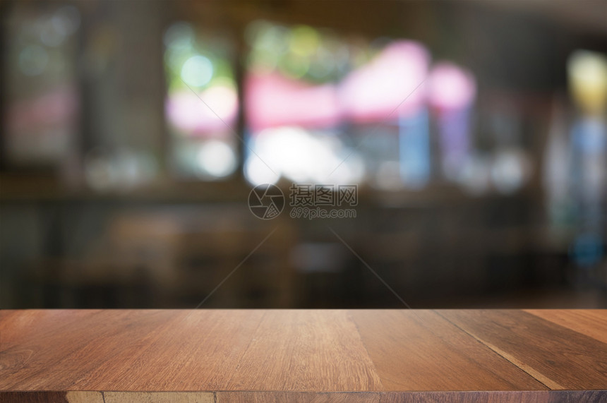 能够空的咖啡店餐厅背景模糊的咖啡厅面前空木板桌图像可以是摆放产品展示图片