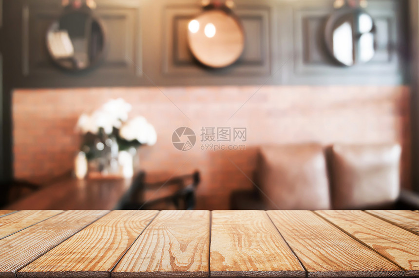 咖啡厅或餐饮背景模糊的咖啡店前空木板桌头棕色的食物图片