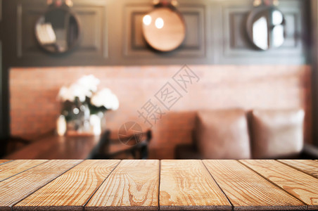 咖啡厅或餐饮背景模糊的咖啡店前空木板桌头棕色的食物图片
