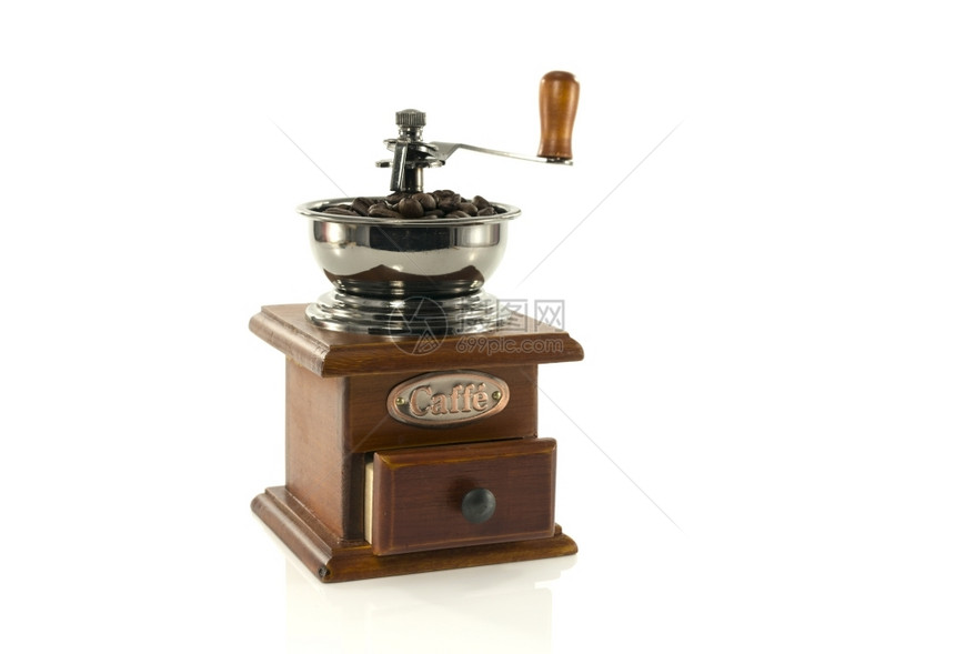 装满豆子的老咖啡磨机要喝好咖啡木头制的图片