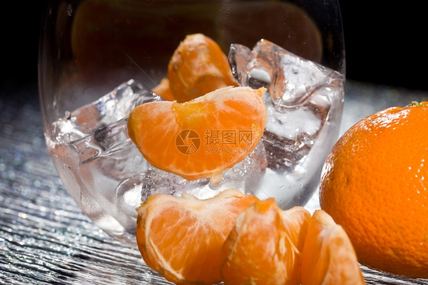 立方体不含酒精凉爽的冰块上可口橙色漫画照片图片