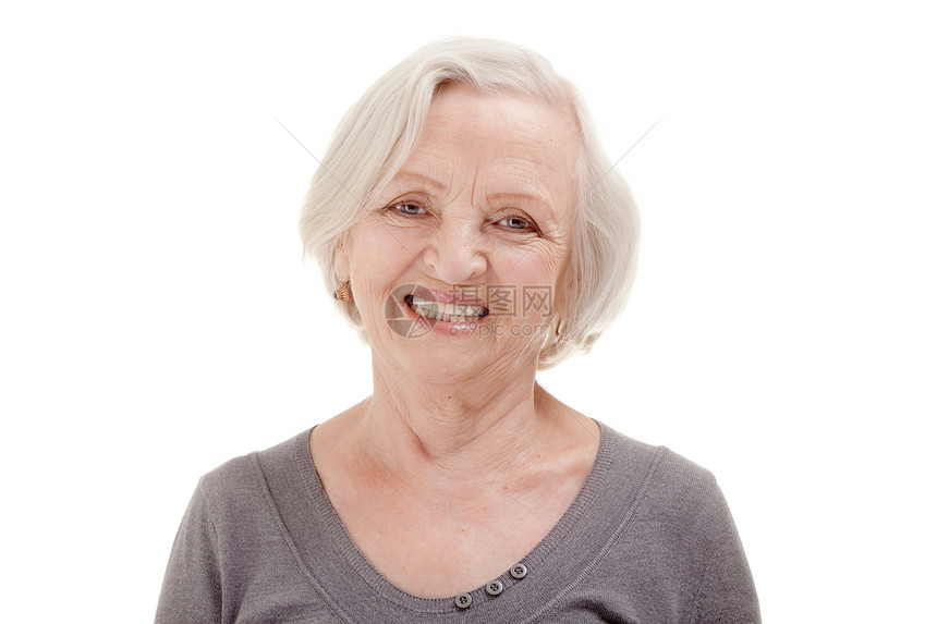 高级的白色背景快乐年长女子肖像笑脸图片