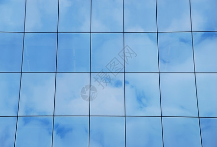 天空现代办公大楼玻璃模式云层反射的玻璃模式生长蓝色的图片