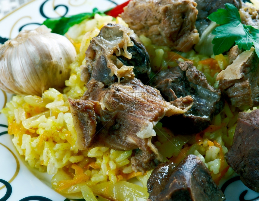 乌国大餐配有羔羊和大米印度人传统的羊肉图片