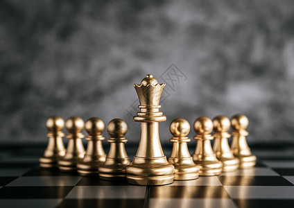赢斗争金象棋在盘游戏中的商业比喻领导力概念玩图片
