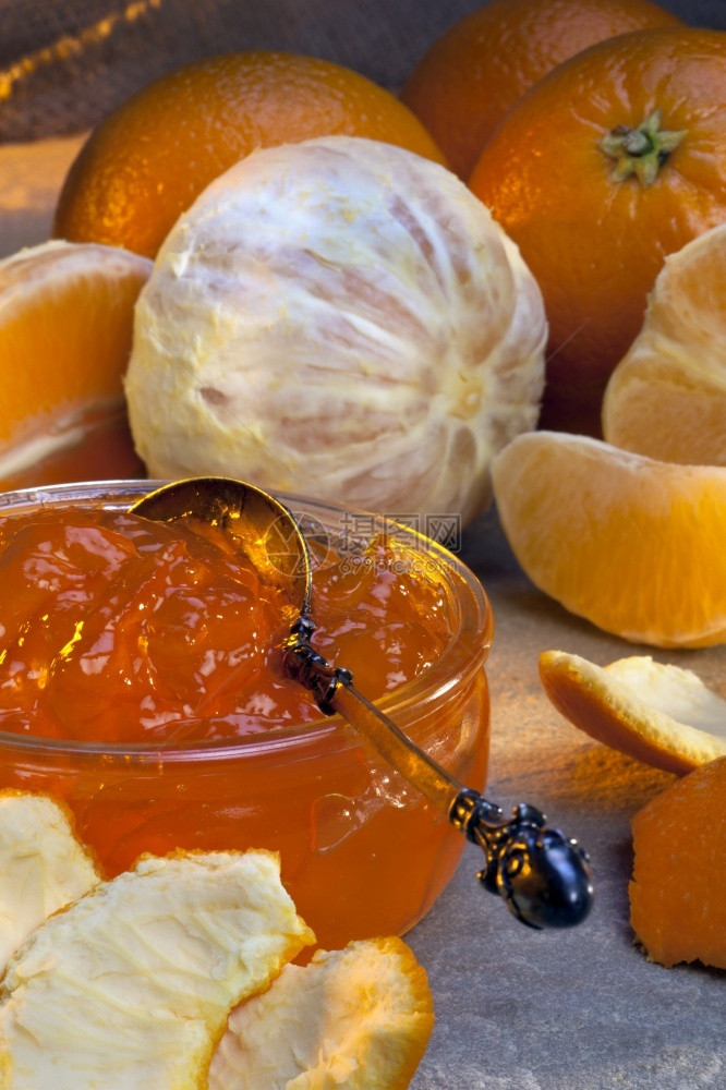 柑橘酱是用糖和水煮的柑橘果汁和皮制成的园可来自库姆夸特柠檬石灰葡萄果芒甜橙子白兰地和其他柑橘类水果英国用于生产柑橘制品的基准类水图片