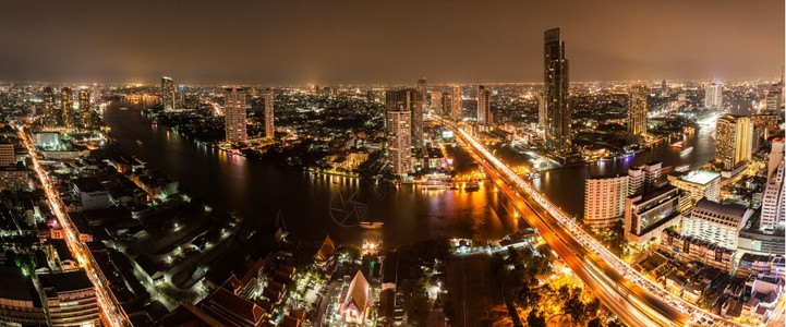旅行建造曼谷市高端恰奥普拉亚河附近有现代化建筑和交通城市图片