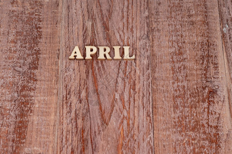 月日历模板木制背景上的月份名称4日历模板乡村创造力象征图片