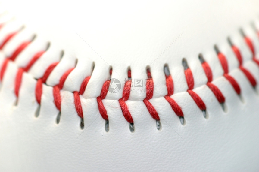 莱纳勒近距离的白色棒球和红接缝皮革快球图片