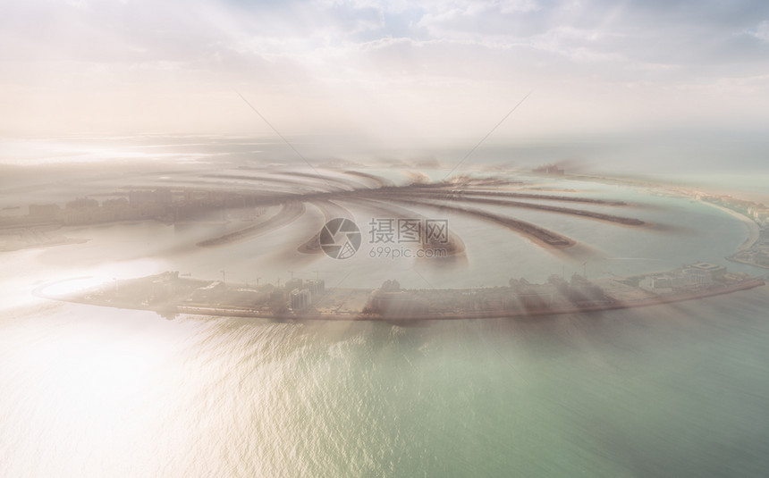 水平的迪拜棕榈朱梅伊拉岛日落海景迪拜棕榈果贝拉岛日落空中住宅水图片