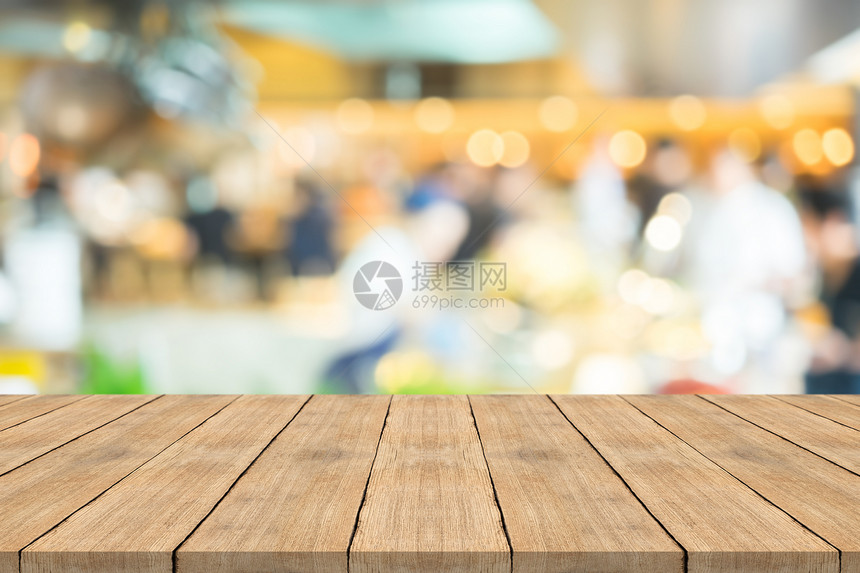 黄色的柜台咖啡店背景模糊的空棕色木板复制您产品可补装的空间Name空的图片