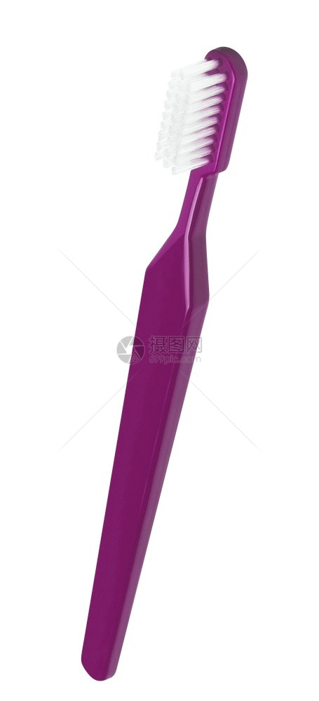 白色上孤立的紫塑料牙刷个人超过紫色的图片