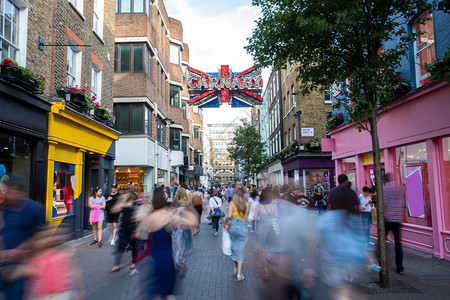 旅行面目全非购物英国伦敦卡纳比街售货者运动模糊图片