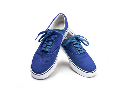 一双蓝色帆布鞋在白背景和剪切路径上被孤立皮革户外蓝色的图片