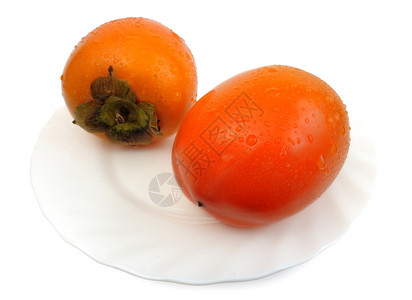 盘子里的柿子图片