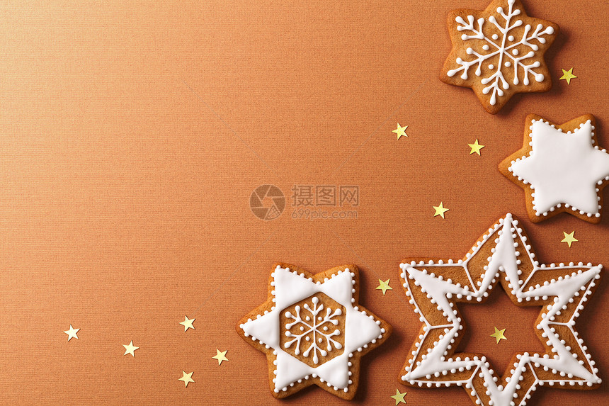 自制圣诞姜红面包棕色纸上金星的烘烤卡片图片